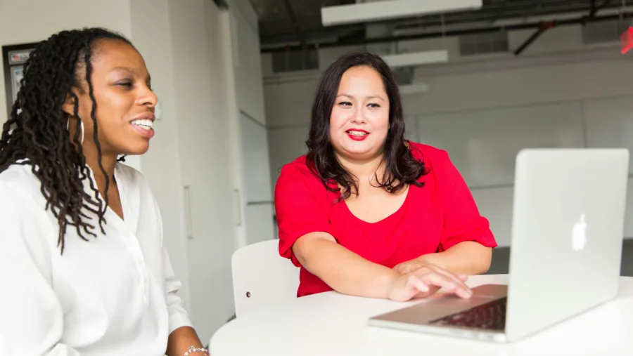Two women at a computer