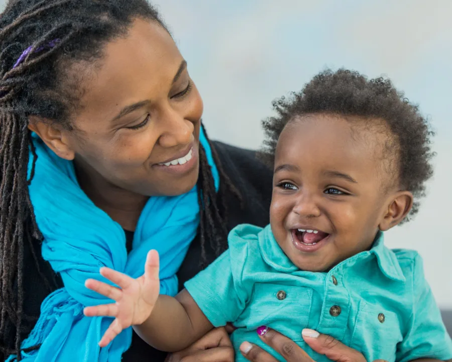 Mom and Toddler smiling