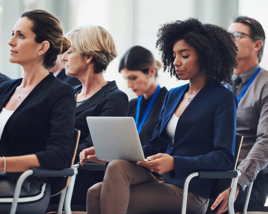 group of professionals at a conference, meeting