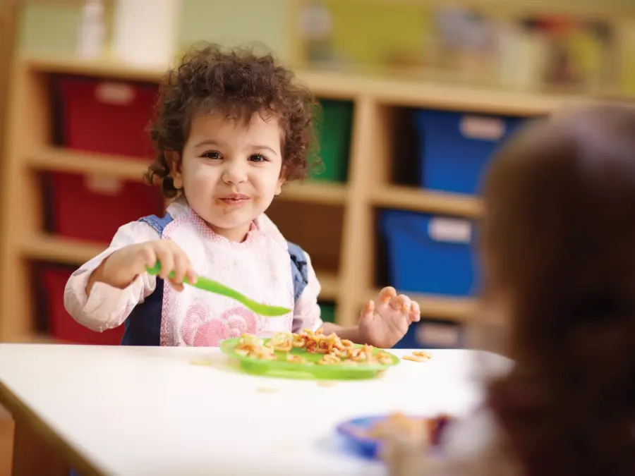 iStock-120687516-TODDLER-EATING-AT-SCHOOL.jpg