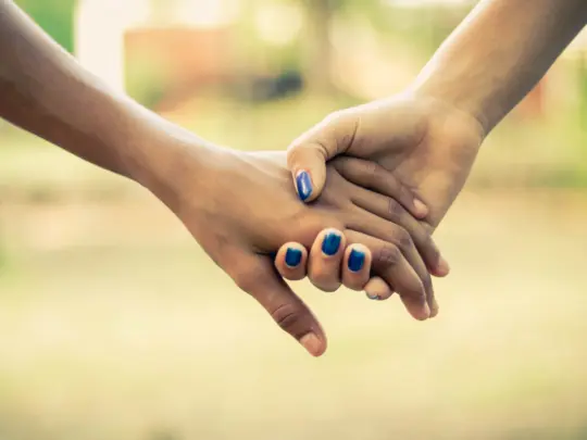 two-people-holding-hands-1101732-2-scaled-1.jpg